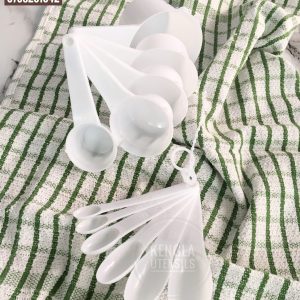 White 11 piece measuring cups and spoons.