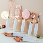 7 PIECE ROSE GOLD AND WHITE STAINLESS STEEL UTENSILS SET