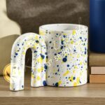 450ML RAINBOW HANDLE CERAMIC MUG.SPLASH