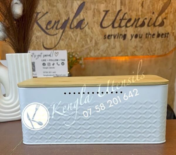 White Airtight metallic bread bin with bamboo lid.