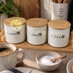 Ceramic Green Leaf Design Canister Set with Wooden Lid And Tray.